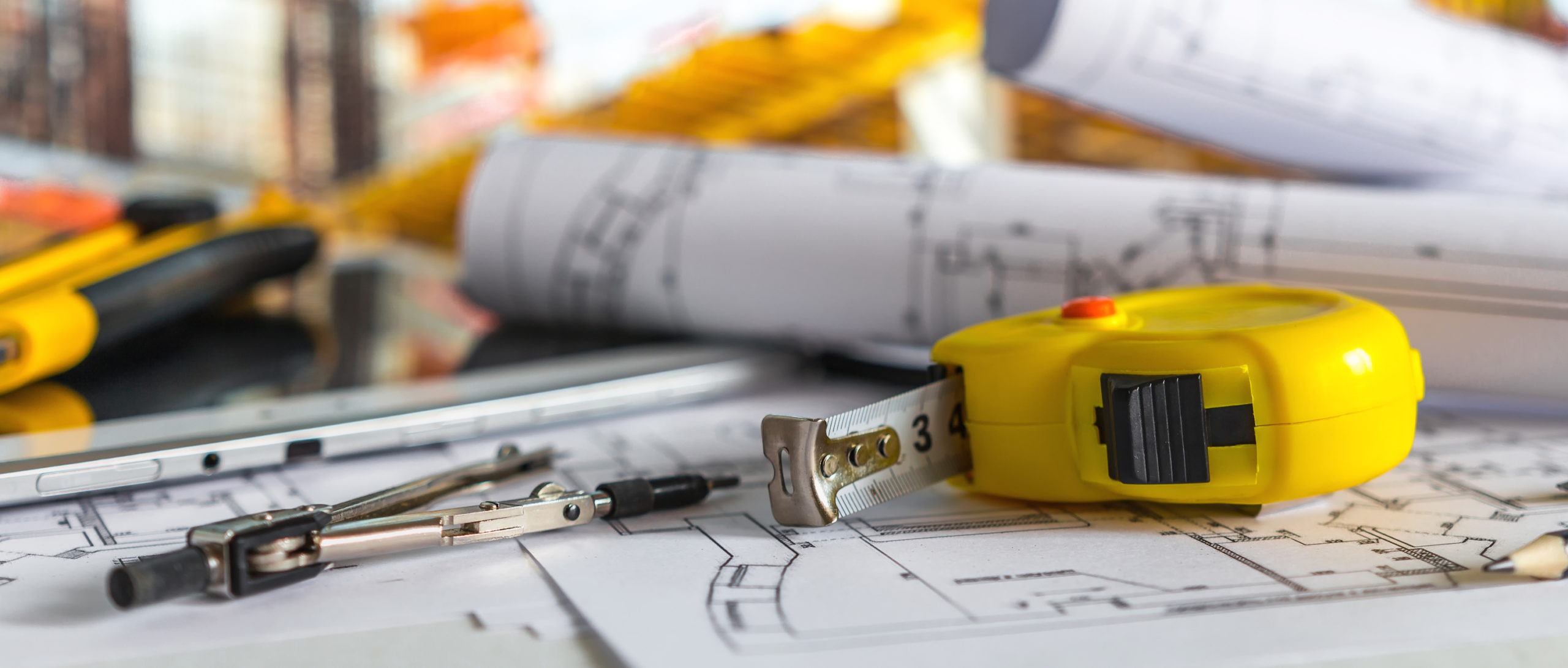 Lien release concept. architect design working drawing sketch plans blueprints and making architectural construction model in architect studio.